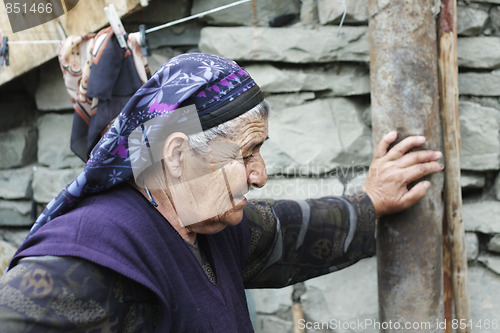 Image of Senior woman stopped for short respite