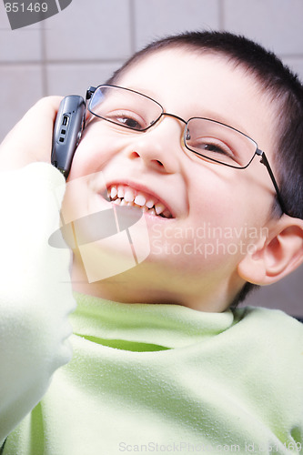 Image of Smiling boy on phone