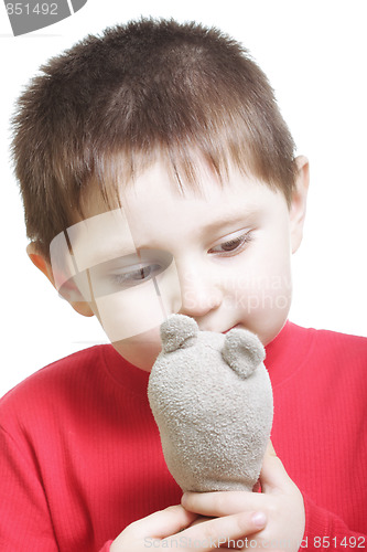 Image of Little boy with soft toy