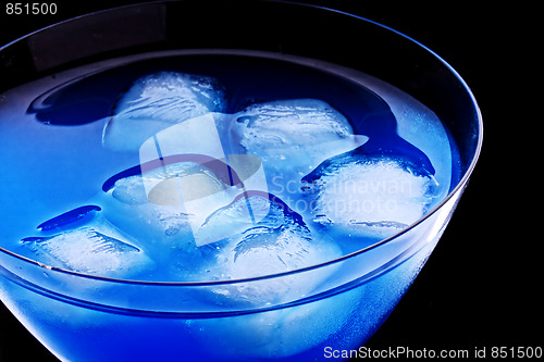 Image of Ice cubes in blue cocktail