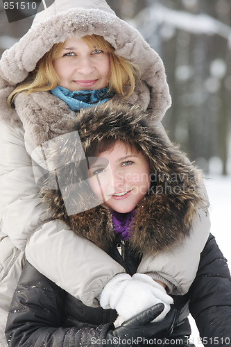 Image of Two young women in winter day