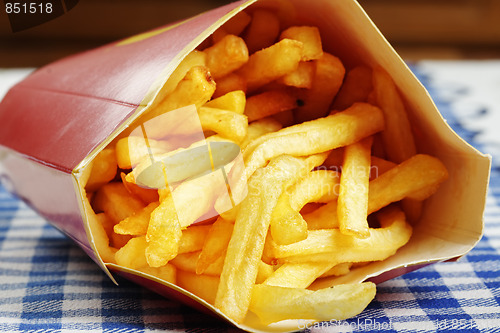 Image of French fries on table