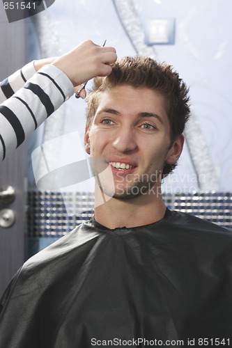 Image of Man have haircut