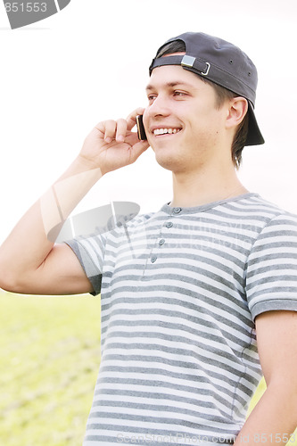 Image of Positive guy with phone