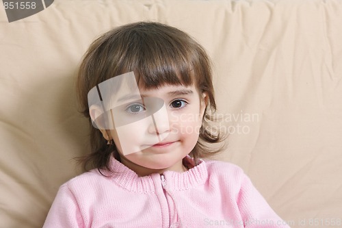 Image of Cute girl in pink sweater