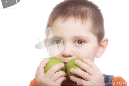 Image of Boy with two green apples