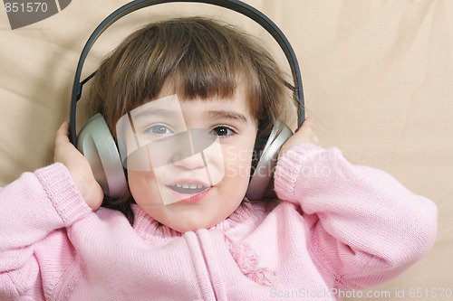 Image of Singing girl with big headphones