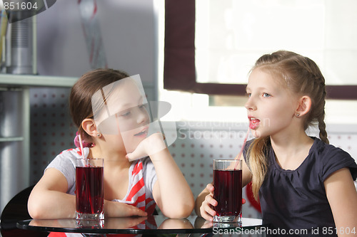 Image of Girls in cafe with juice