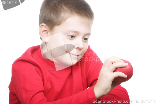 Image of Smiling boy with red apple