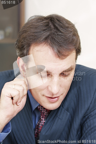 Image of Businessman solving task