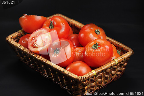 Image of Basket with ripe red tomatoes
