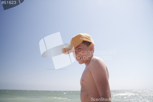 Image of Smiling boy at sea