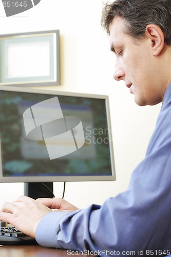 Image of Businessman typing