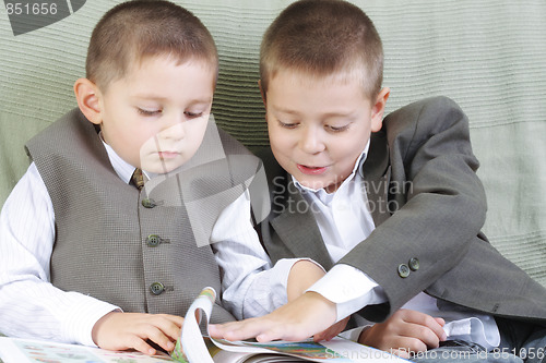 Image of Brothers with book