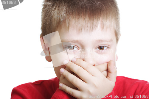 Image of Boy in red shutting mouth