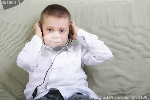 Image of Kid with headset phone