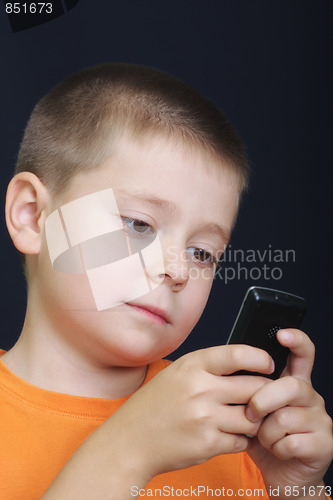 Image of Kid reading message on cellphone