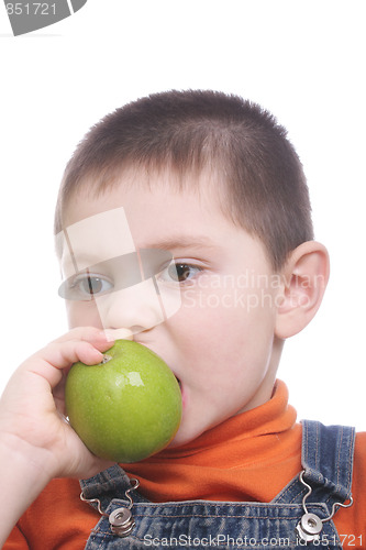 Image of Kid biting apple