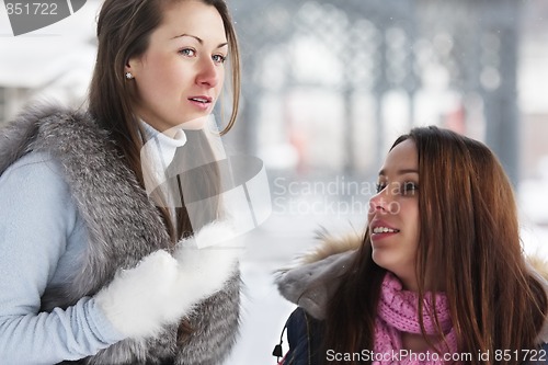 Image of Two young women in winter day