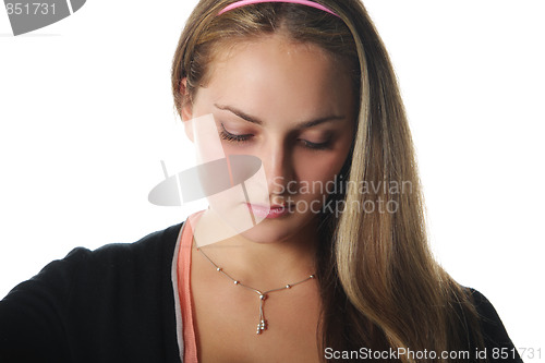 Image of Thoughtful woman in sportswear
