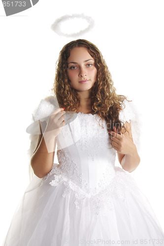 Image of Serious angel in white dress