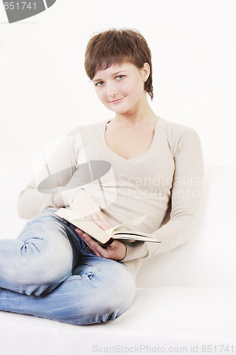 Image of Young woman with book