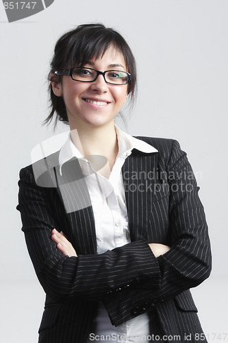 Image of Smiling confident businesswoman