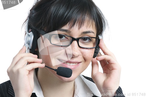 Image of Smiling brunette businesswoman with headset