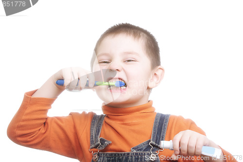 Image of Boy with toothpaste and brush