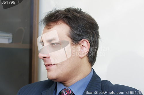 Image of Concentrated businessman sideview