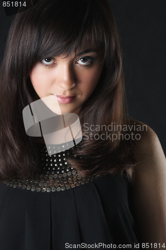 Image of Portrait of serious woman with brown eyes
