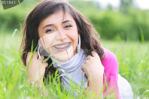 Image of Positive brunette in grass
