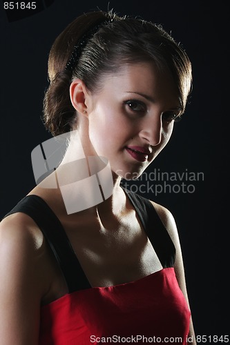 Image of Brunette in red
