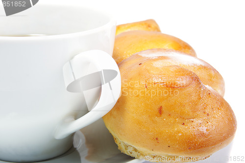 Image of Cup and bun against white