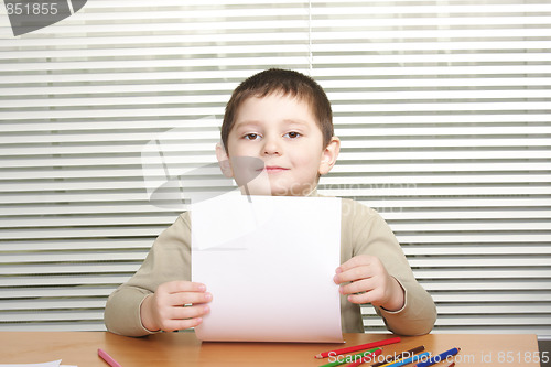 Image of Boy with blank paper