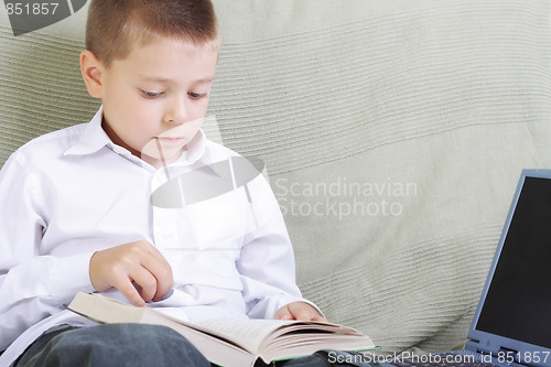 Image of Boy reading book