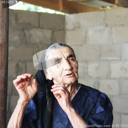 Image of Gesticulating elderly woman 