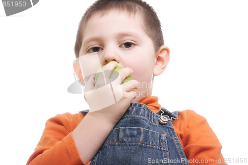 Image of Boy biting apple