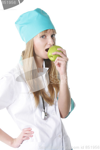 Image of Doctor biting apple