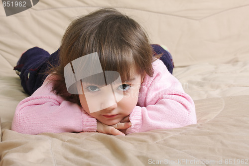 Image of Girl laying on sofa