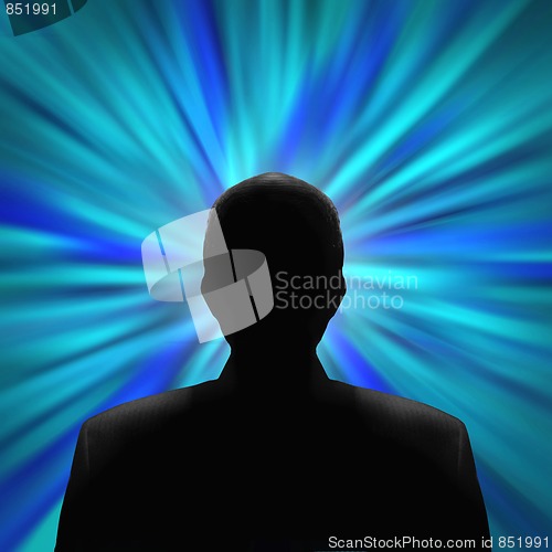 Image of Silhouetted man in front of a blue vortex