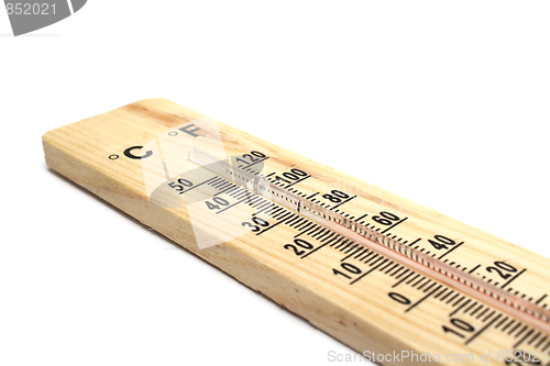 Image of Wooden thermometer on white background