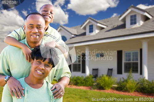 Image of Attractive African American Family in Front of Home