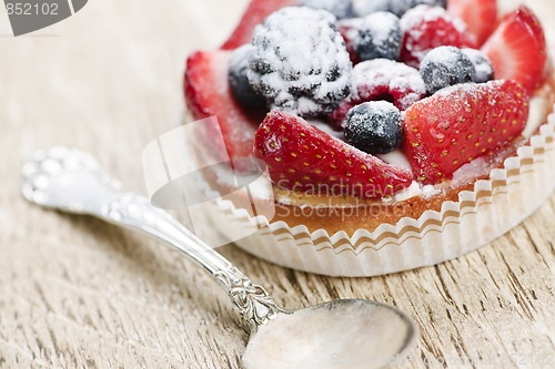 Image of Fruit tart with spoon