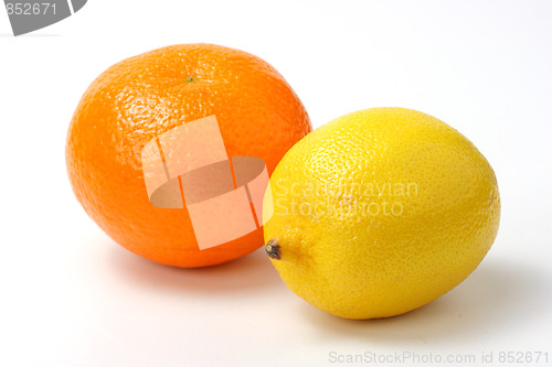 Image of Red mandarin and yellow lemon