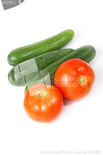 Image of Tasty kitchen. Fresh vegetables isolated on white
