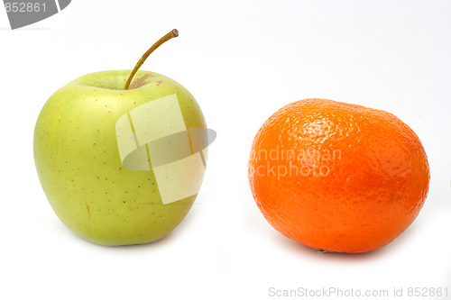 Image of Red mandarin and green apple