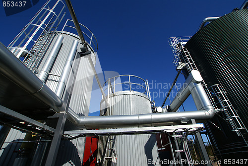 Image of Industrial zone, Steel pipe-lines on blue sky