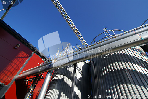 Image of Industrial zone, Steel pipe-lines on blue sky