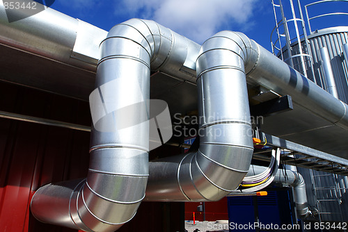 Image of Pipes, tubes, cables and equipment at a power plant